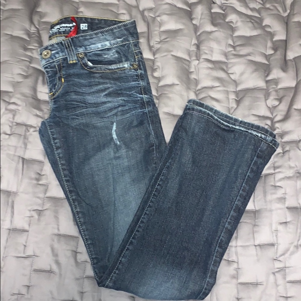 Distressed Guess Daredevil bootcut jean